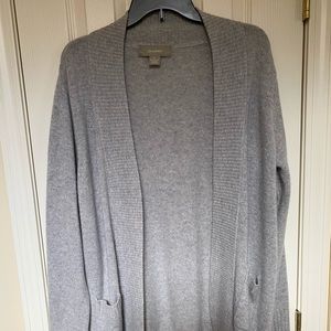 Gray cashmere sweater with pockets.